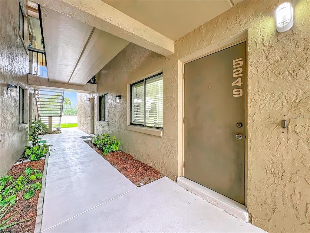 5249 Vineland Road Orlando, FL 32811 - Photo 1 of 42 a view of a entryway door of the house