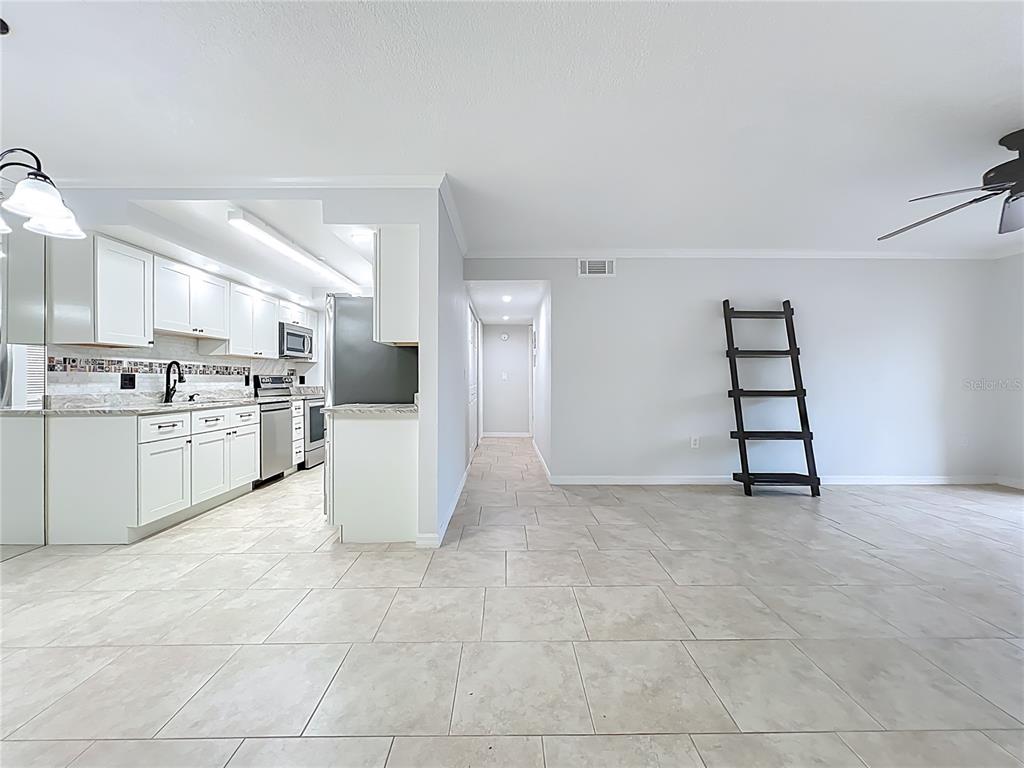 5249 Vineland Road Orlando, FL 32811 - Photo 11 of 42 a view of a kitchen with a sink