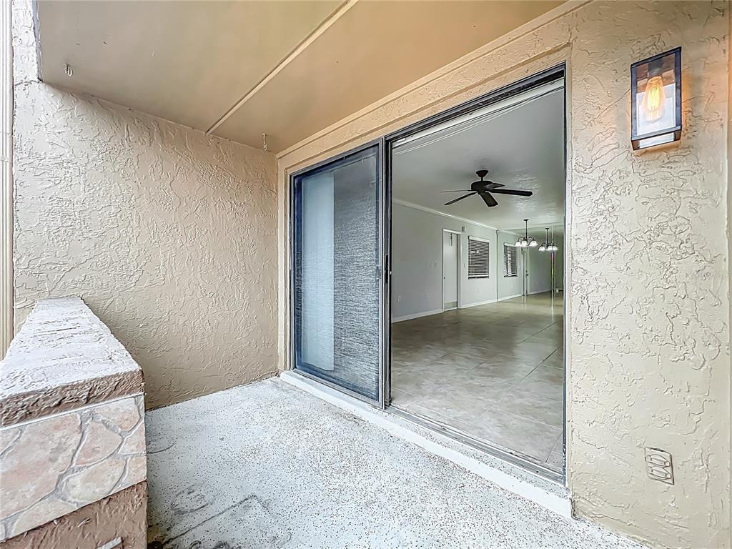 5249 Vineland Road Orlando, FL 32811 - Photo 37 of 42 a view of livingroom with an empty space