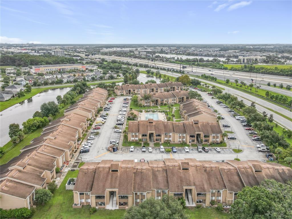 5249 Vineland Road Orlando, FL 32811 - Photo 41 of 42 a view of a city with a lake