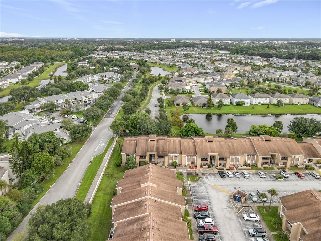 5249 Vineland Road Orlando, FL 32811 - Photo 42 of 42 an aerial view of a city with lots of residential buildings