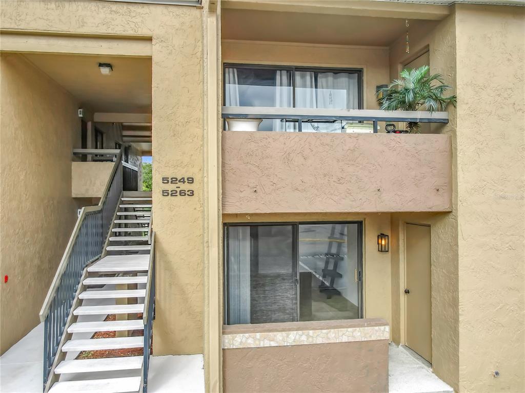 5249 Vineland Road Orlando, FL 32811 - Photo 5 of 42 a view of a balcony and front door
