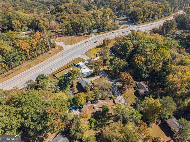 a view of a yard with wooden floor