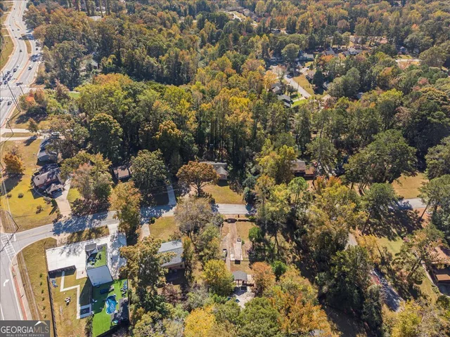 a view of a tree in a yard