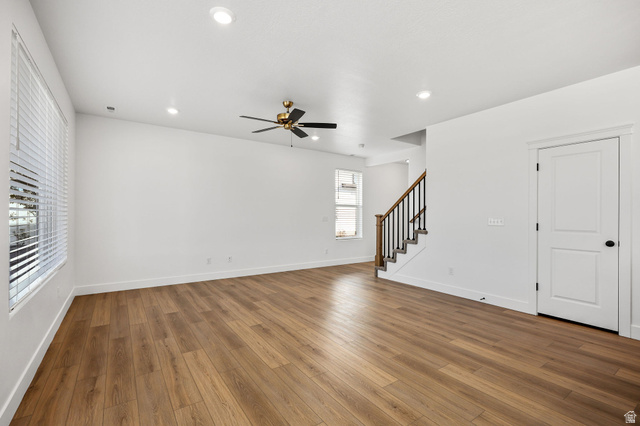 1661 West Ross Road Syracuse, UT 84075 - Photo 6 of 28 Unfurnished living room featuring hardwood / wood-style floors, ceiling fan, and recessed lighting