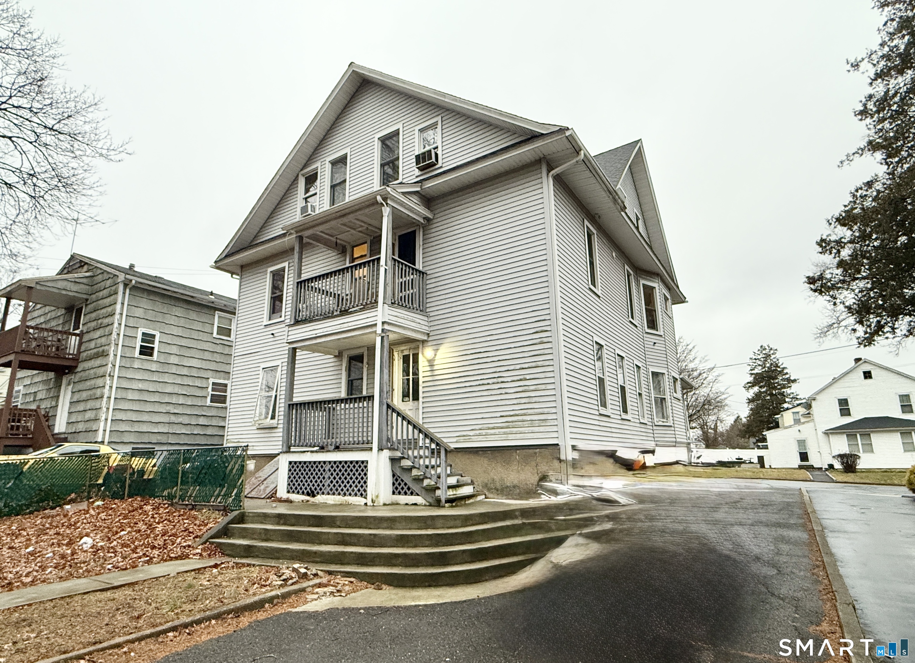 26 Victory Street Bridgeport, CT 06606 - Photo 29 of 32 a front view of a house with a yard