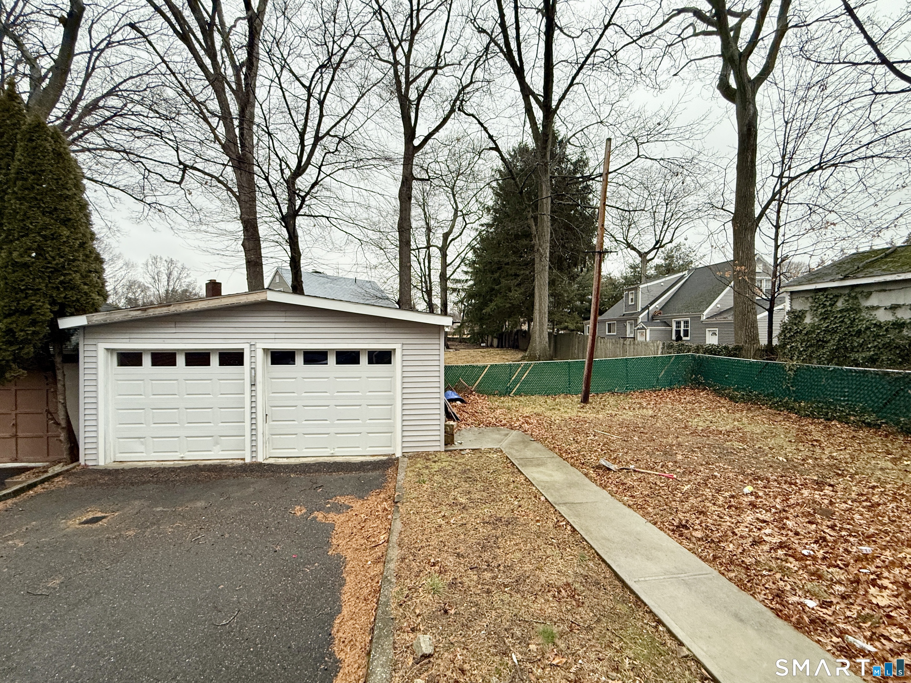26 Victory Street Bridgeport, CT 06606 - Photo 32 of 32 a front view of a house with a yard