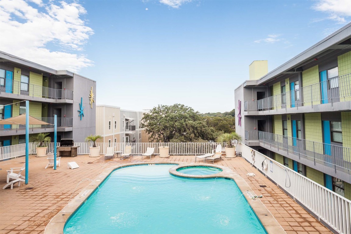 2408 Leon Street, Unit 218 Austin, TX 78705 - Photo 2 of 7 a view of a swimming pool with a deck