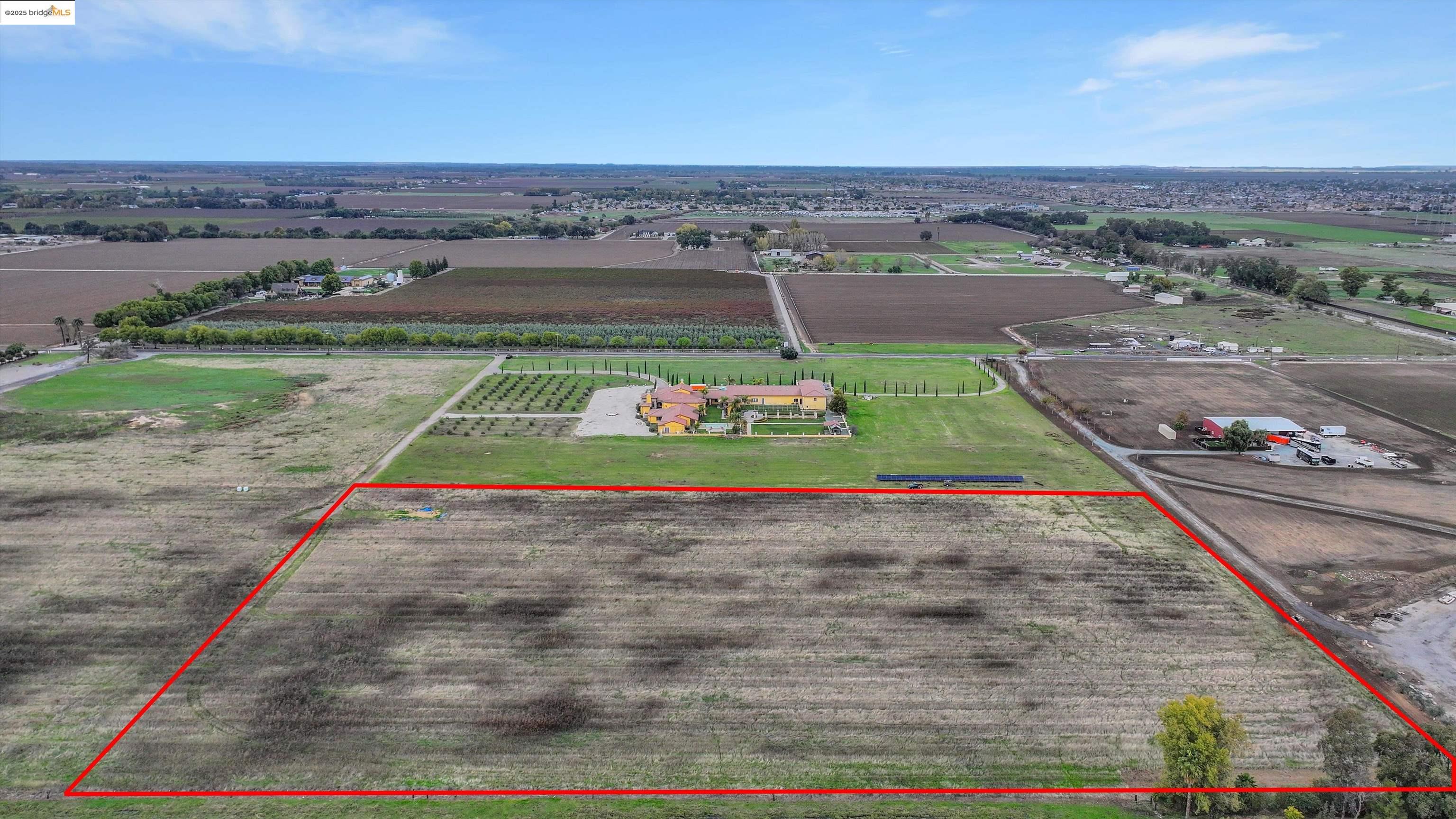 3590 Byer Road Byron, CA 94514 - Photo 10 of 12 View of rural area with property parcel outlined and farmland
