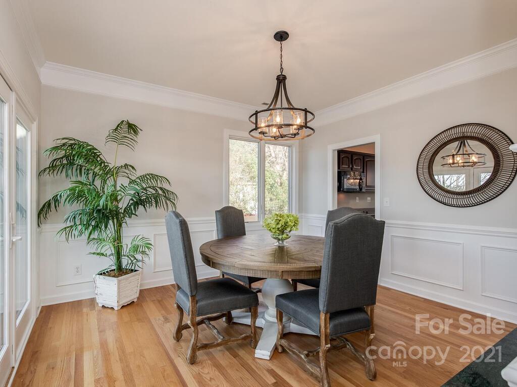 8683 Howard Drive Terrell, NC 28682 - Photo 16 of 46 a view of a dining room with furniture window and wooden floor