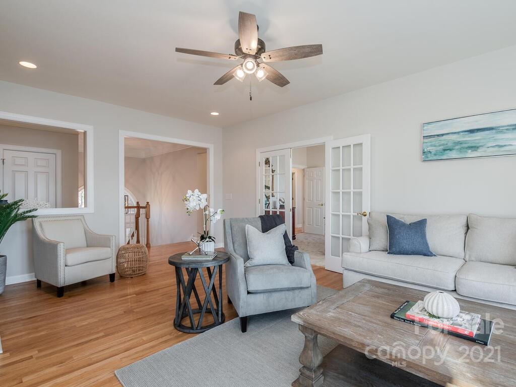 8683 Howard Drive Terrell, NC 28682 - Photo 18 of 46 a living room with furniture and a wooden floor
