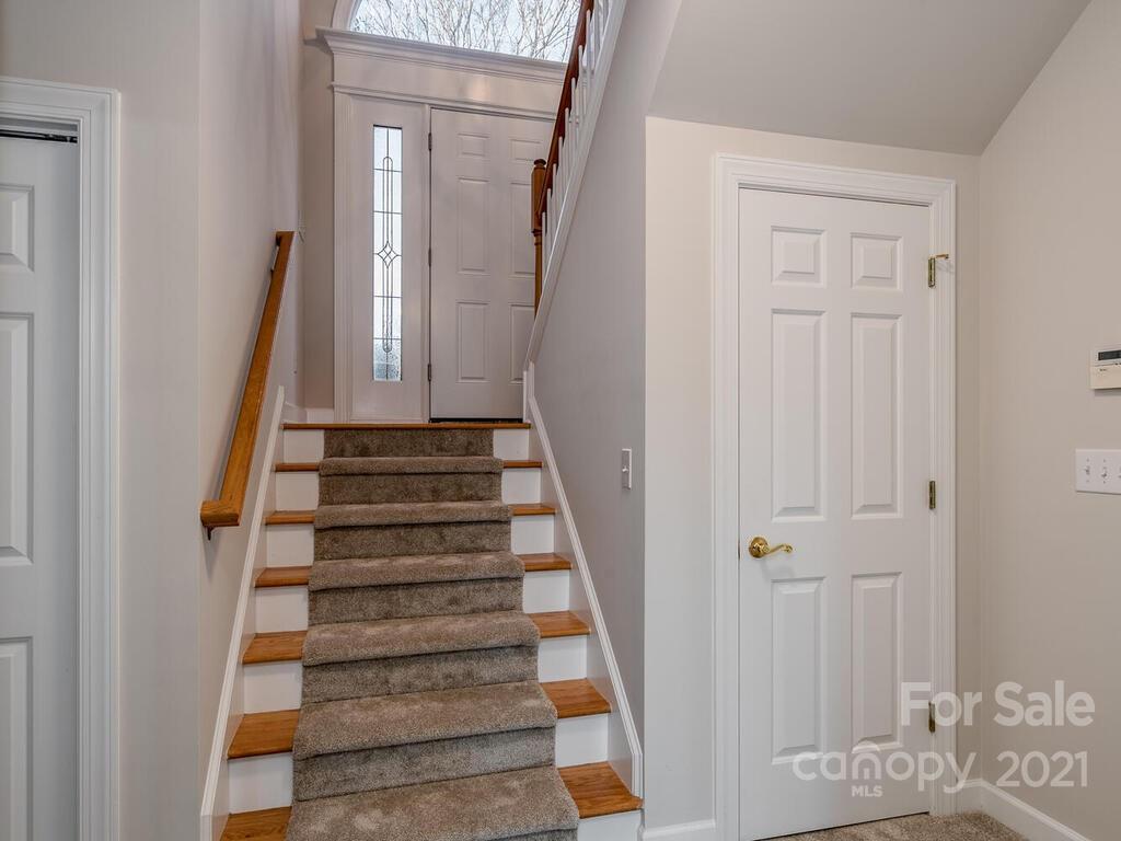 8683 Howard Drive Terrell, NC 28682 - Photo 29 of 46 a view of a hallway with wooden floor and entryway