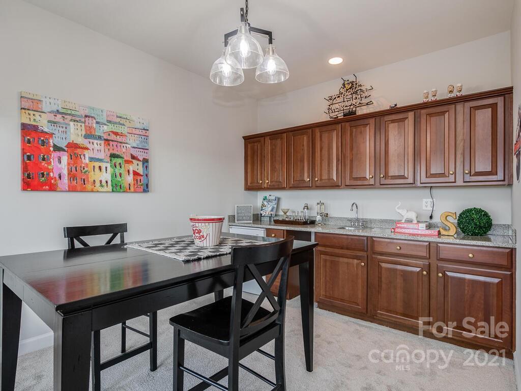 8683 Howard Drive Terrell, NC 28682 - Photo 34 of 46 a kitchen with a sink cabinets and window