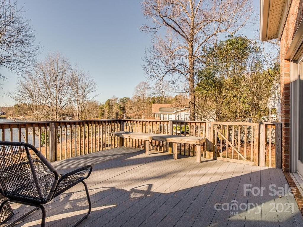 8683 Howard Drive Terrell, NC 28682 - Photo 38 of 46 a view of a balcony with wooden floor and outdoor seating