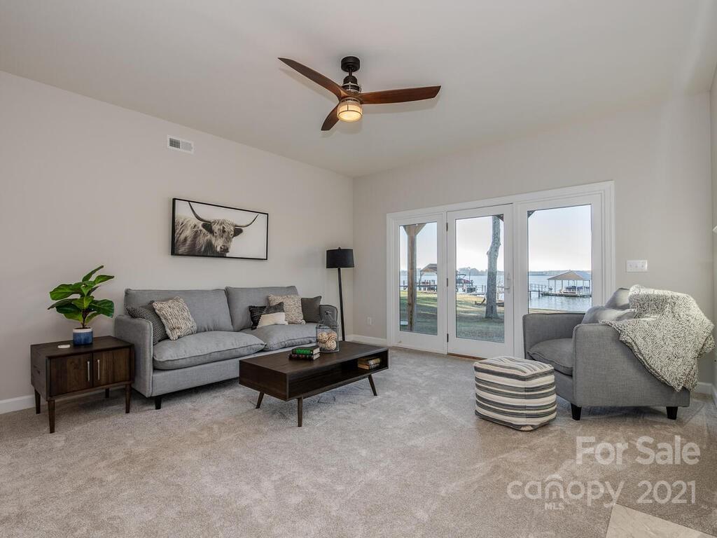 8683 Howard Drive Terrell, NC 28682 - Photo 4 of 46 a living room with furniture and a large window
