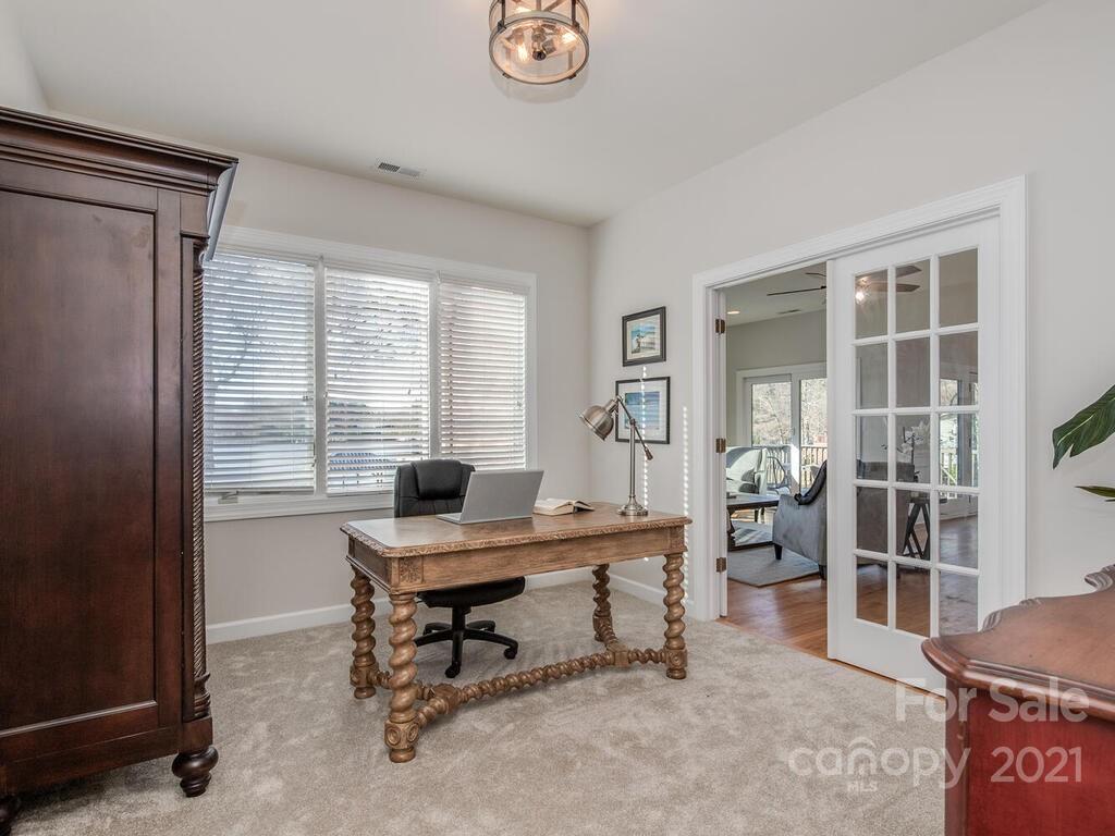 8683 Howard Drive Terrell, NC 28682 - Photo 6 of 46 a view of a workspace with furniture and a window
