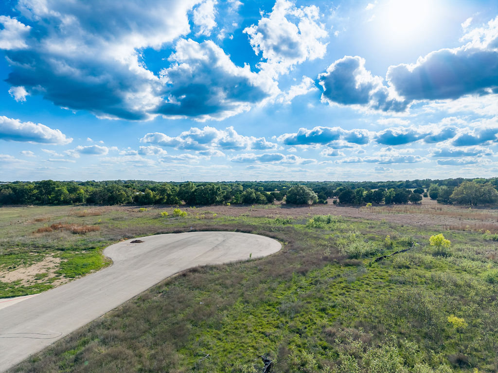 177 West Rio Ranch Road Liberty Hill, TX 78642 - Photo 13 of 30 a view of a lake with a yard