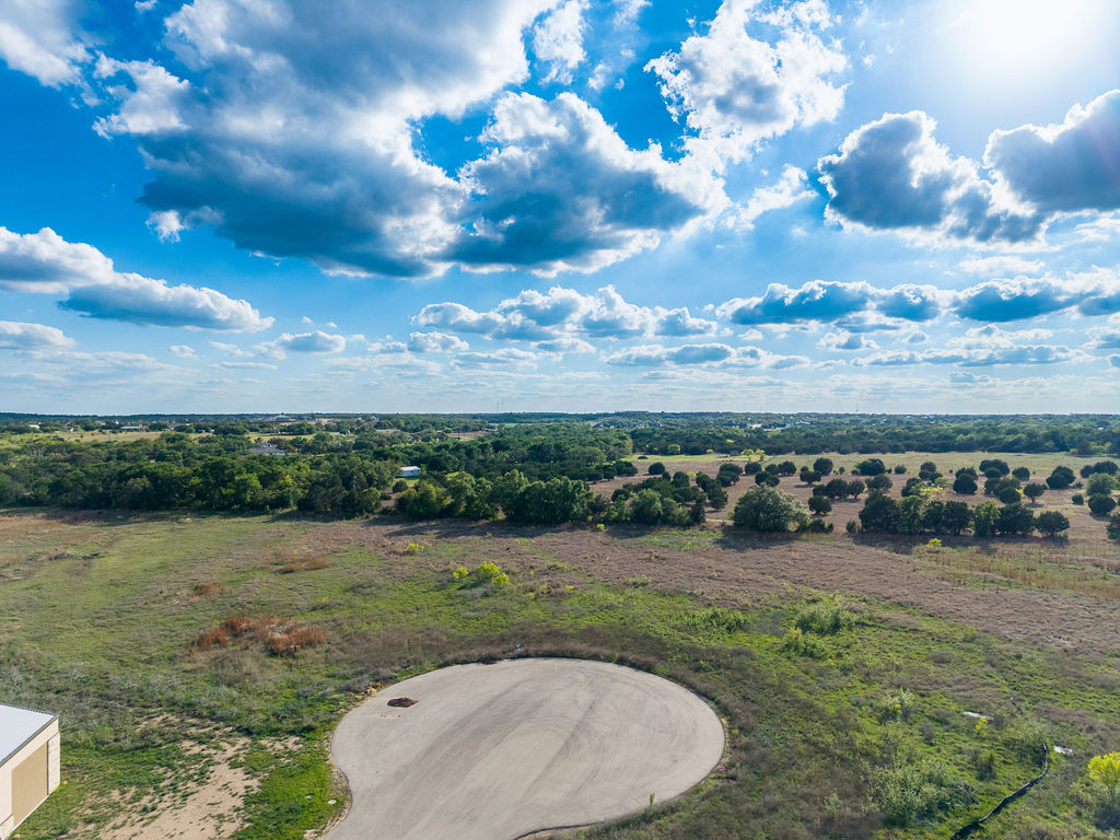 177 West Rio Ranch Road Liberty Hill, TX 78642 - Photo 14 of 30 a view of a golf course with a lake view