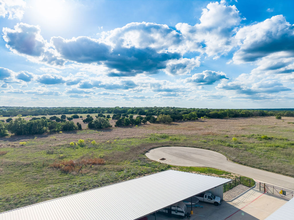 177 West Rio Ranch Road Liberty Hill, TX 78642 - Photo 15 of 30 a view of a lake with a yard
