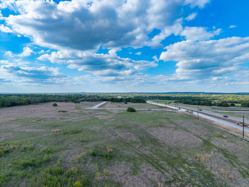 177 West Rio Ranch Road Liberty Hill, TX 78642 - Photo 4 of 30 a view of a field with an trees