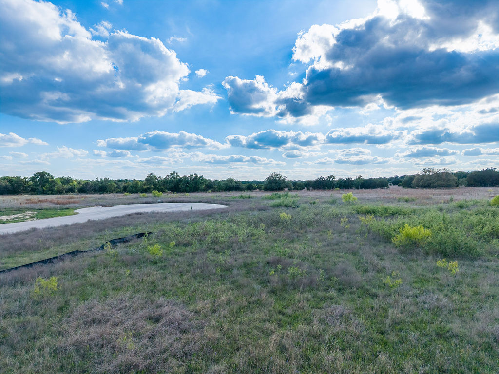 177 West Rio Ranch Road Liberty Hill, TX 78642 - Photo 9 of 30 a view of a lake with outdoor space