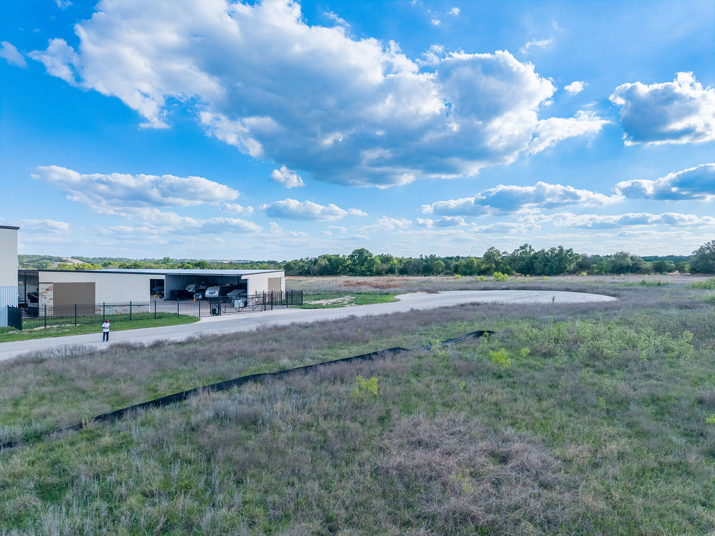 177 West Rio Ranch Road Liberty Hill, TX 78642 - Photo 10 of 30 a view of a yard with an outdoor space