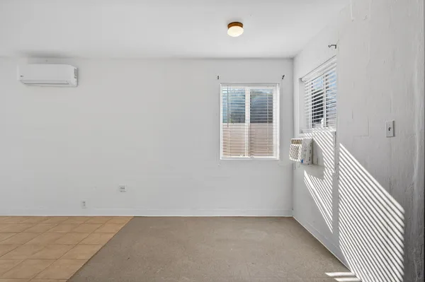 an empty room with windows