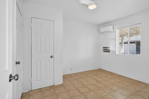 a view of a room with a window