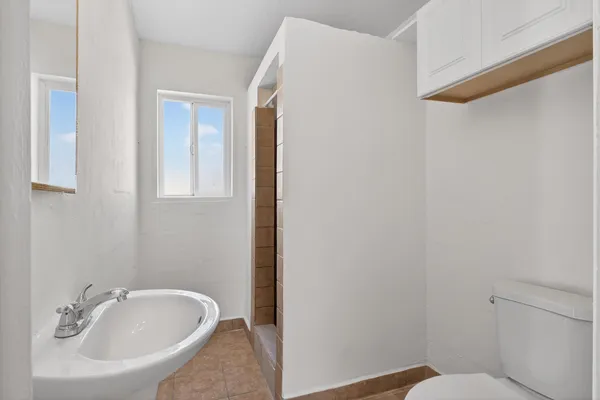 a bathroom with a sink and a toilet