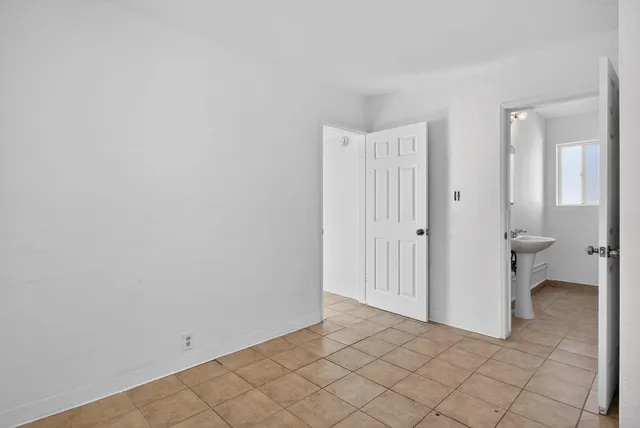 a view of a room with a wardrobe space