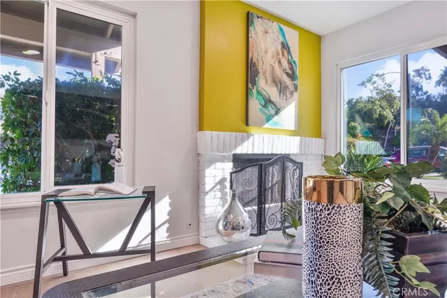 a front view of a house with outdoor seating