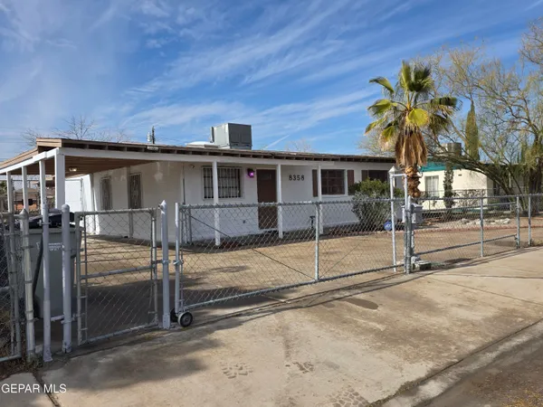 a front view of a house with a garage
