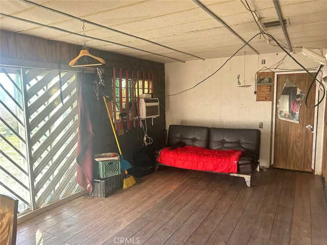 a view of entryway with a wooden deck