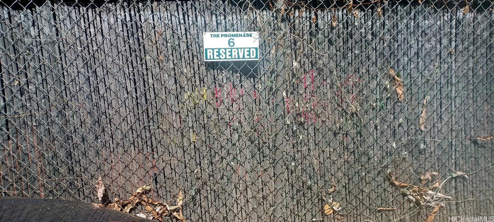 423 Kaiolu Street, Unit 106 Honolulu, HI 96815 - Photo 20 of 25 a view of a brick wall with a window