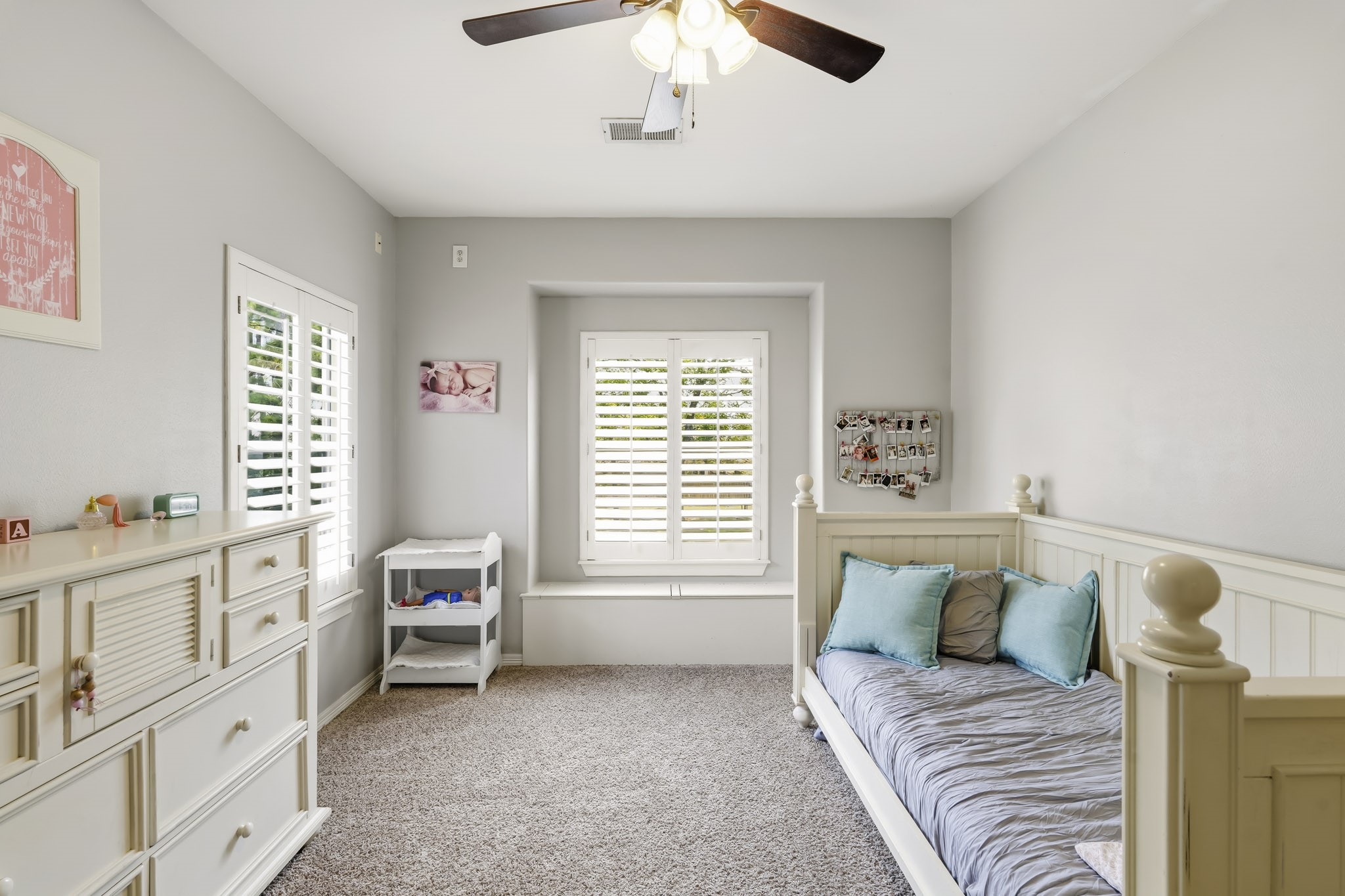 3630 Orca Court Spring, TX 77388 - Photo 37 of 50 Secondary Bedroom #1, Cozy bedroom with ample natural light, featuring a charming window seat perfect for relaxation.