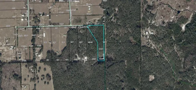 a view of a backyard of a house