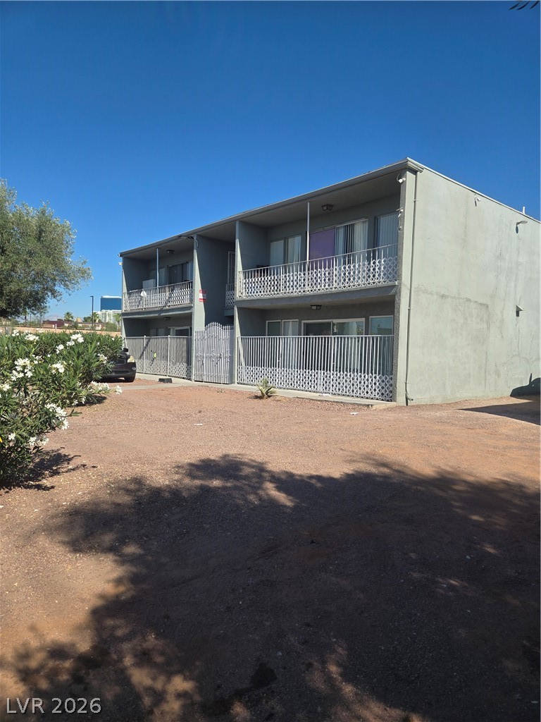 1388 East Desert Inn Road, Unit 2 Las Vegas, NV 89169 - Photo 1 of 23 Multi-level residential building with balconies provides comfortable living.