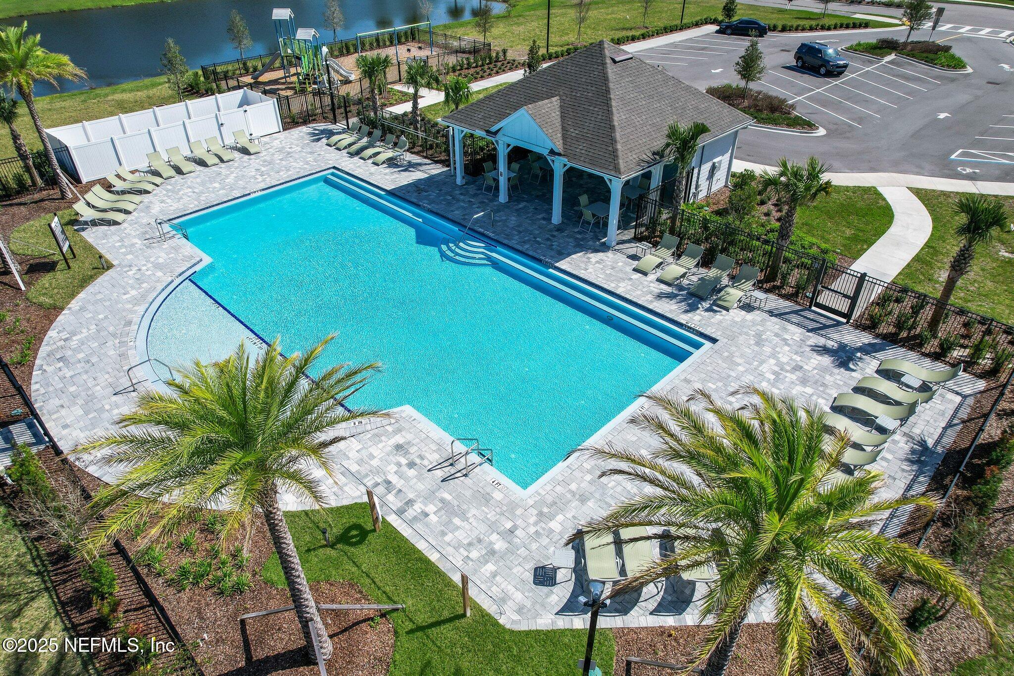 72 Wards Ravine Way St. Johns, FL 32259 - Photo 54 of 57 an aerial view of a house with garden space and swimming pool