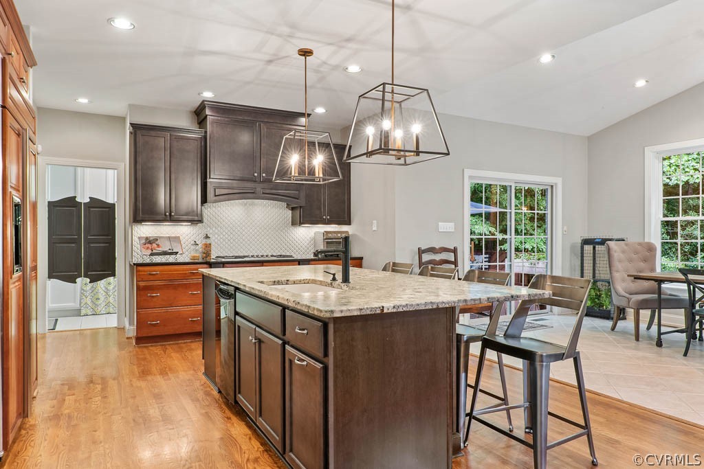 14837 Felbridge Way Midlothian, VA 23113 - Photo 14 of 50 a kitchen with stainless steel appliances granite countertop a stove and refrigerator