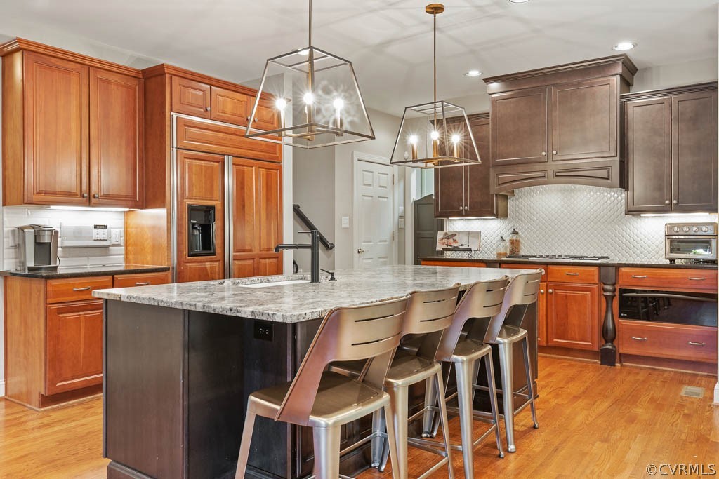 14837 Felbridge Way Midlothian, VA 23113 - Photo 15 of 50 a kitchen with stainless steel appliances granite countertop a sink and cabinets