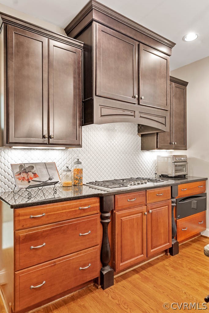 14837 Felbridge Way Midlothian, VA 23113 - Photo 17 of 50 a view of granite countertop cabinets and wooden floor