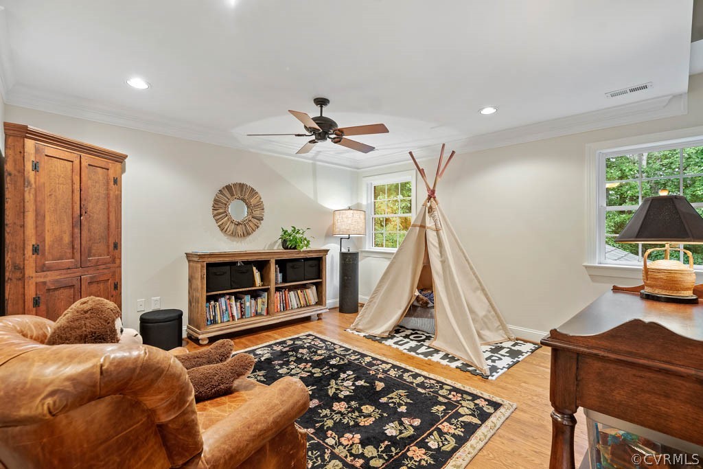 14837 Felbridge Way Midlothian, VA 23113 - Photo 24 of 50 a living room with furniture a window and a flat screen tv