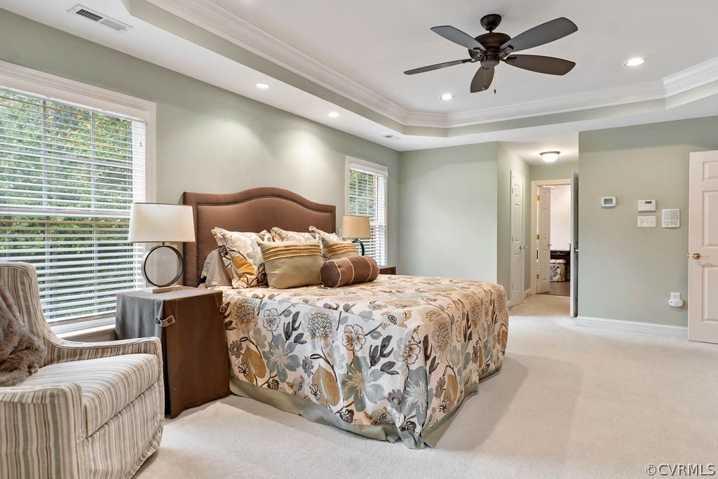 14837 Felbridge Way Midlothian, VA 23113 - Photo 34 of 50 a spacious bedroom with a bed and a chandelier