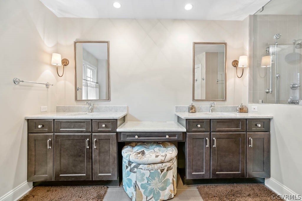 14837 Felbridge Way Midlothian, VA 23113 - Photo 36 of 50 a bathroom with a sink vanity and mirror