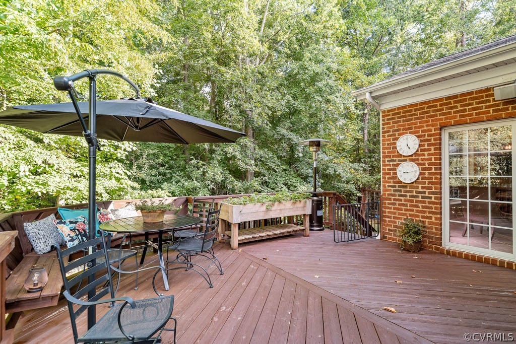 14837 Felbridge Way Midlothian, VA 23113 - Photo 37 of 50 an outdoor space with furniture and umbrella