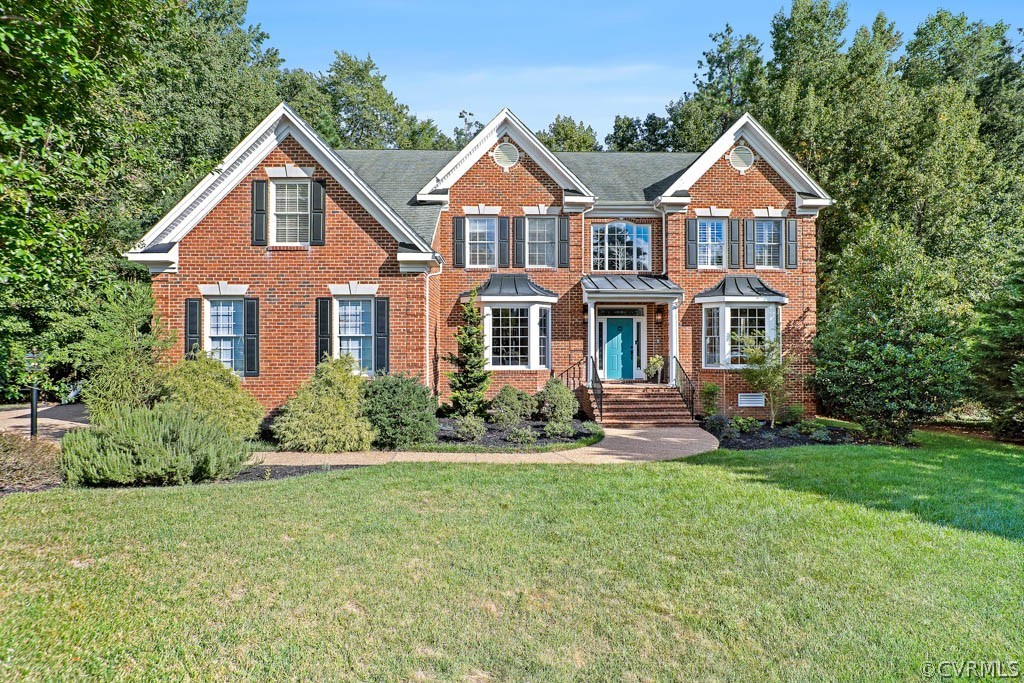 14837 Felbridge Way Midlothian, VA 23113 - Photo 43 of 50 a front view of a house with a yard