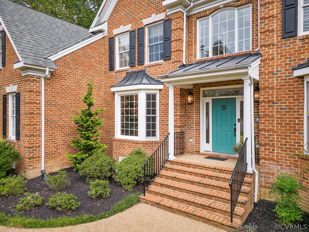14837 Felbridge Way Midlothian, VA 23113 - Photo 50 of 50 a view of a house with a small window and flower plants