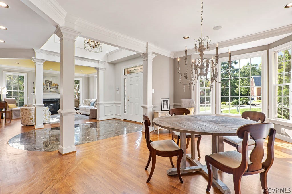 14837 Felbridge Way Midlothian, VA 23113 - Photo 6 of 50 a view of a dining room with furniture wooden floor and chandelier