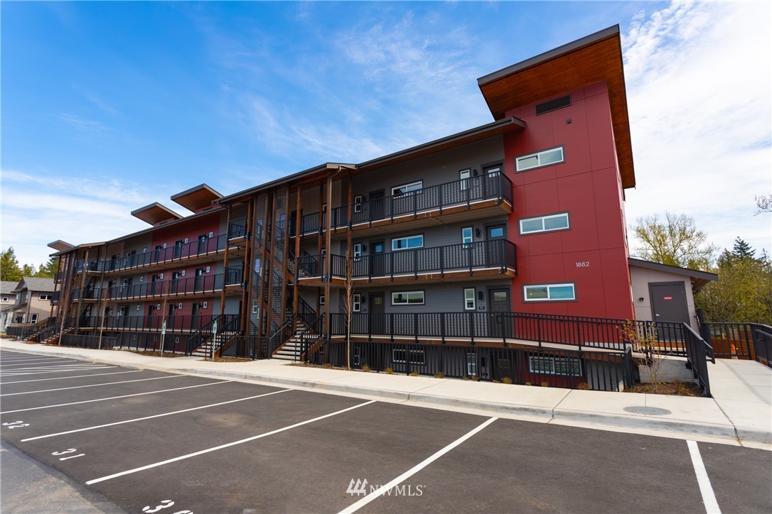 1882 Front Street, Unit 404 Lynden, WA 98264 - Photo 4 of 18 a view of a building with a street