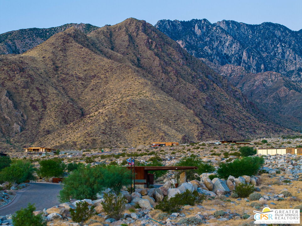 2373 Rising Sun Court Palm Springs, CA 92262 - Photo 6 of 13 a view of a large building with a mountain in the background